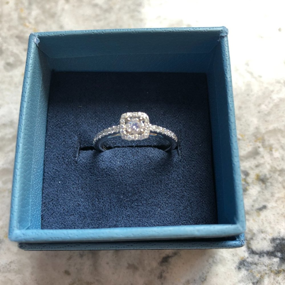14 karat white gold and genuine diamond ring with halo